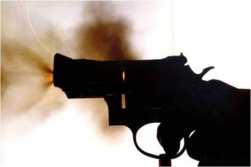 firing in jhunjunu district town, a policeman injured