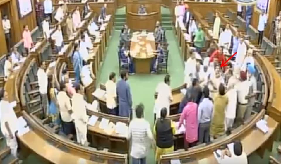 see photos how kapil mishra was taken out of delhi assembly by aam admi party leaders