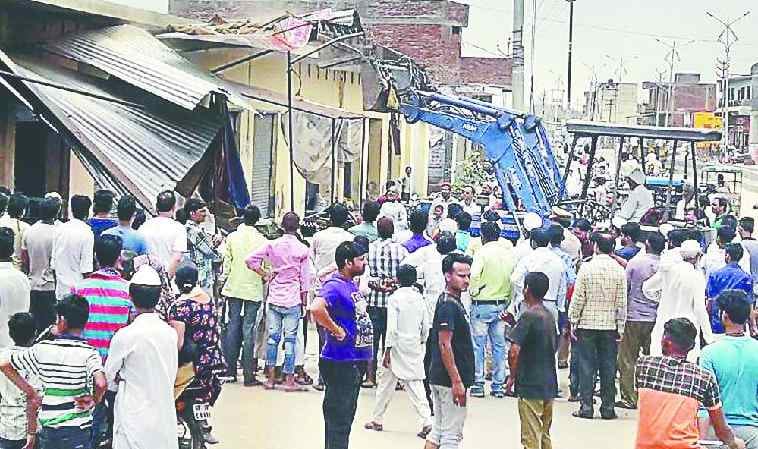 Business Briefs on removal of encroachment