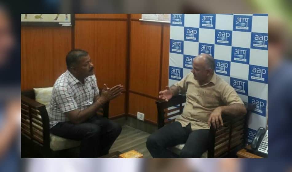 arvind kejriwal and his ministers meet public and listen their problems in janta darbar see photos