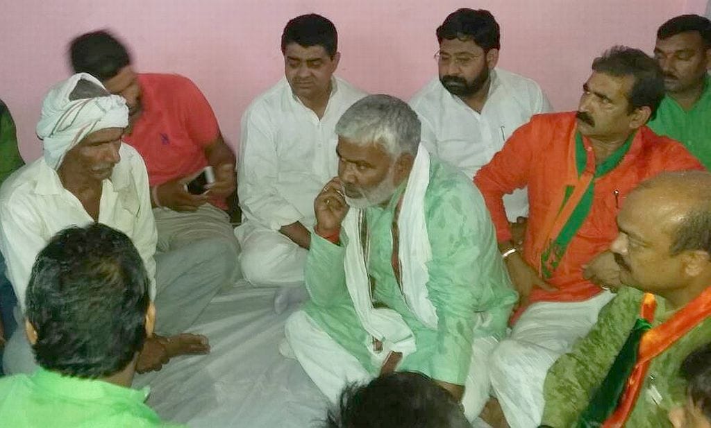 In-charge minister meets kin of martyrs