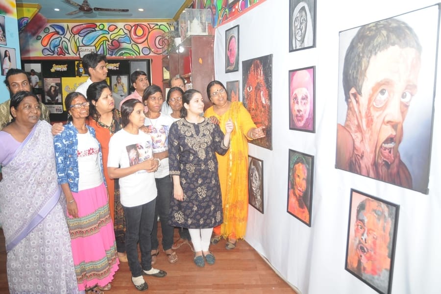 acid attack survivors story on canvas in sheroes hangout cafe in agra 