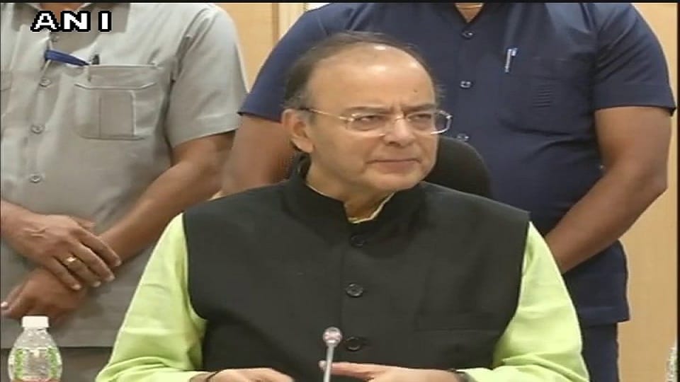 gst council decided tax slab on gold biscuits and branded clothes