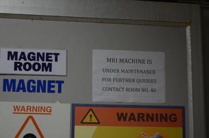 gunner of minister suspended for having gun in MRI room.