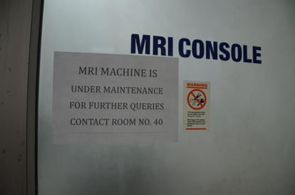 gunner of minister suspended for having gun in MRI room.