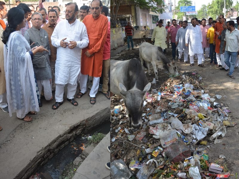 uttar pradesh cabinet minister cleans sewer in Lucknow.