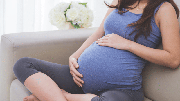 mums of four having giant stone in ovary