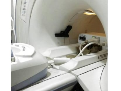 gunner of minister suspended for having gun in MRI room.