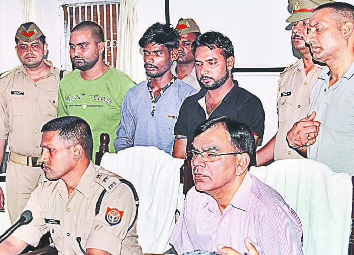 Three arrested, search for 18 accused 