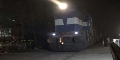  train engine passed and railway crossing gate opened 