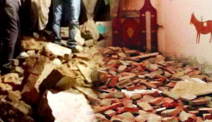 wall collapsed boy dead in under wall debris 