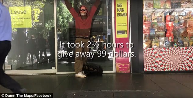 a man like a beggar is providing 100 dollar coin
