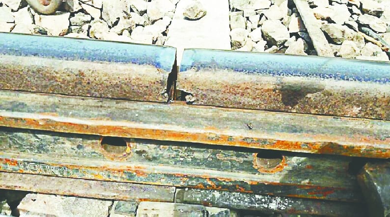 Trains passing through broken tracks