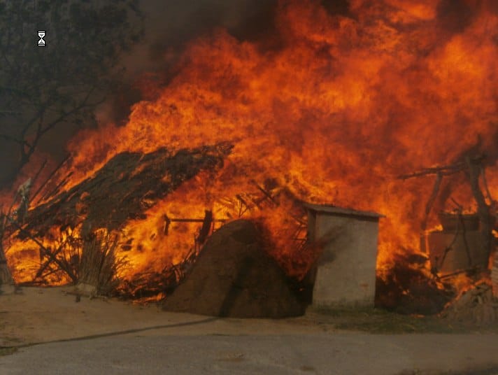 Fire burns six homes, 14 goats burn