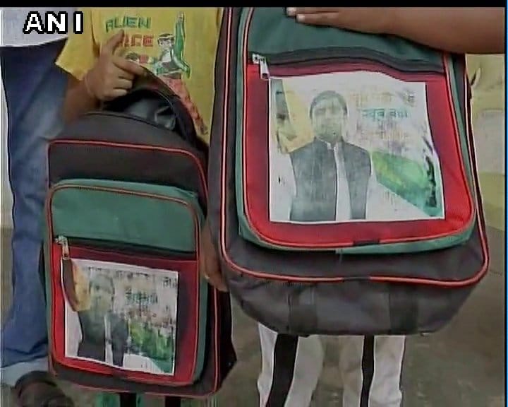 Akhilesh Yadav photo on Gujarat govt school bags distributed in enrollment drive