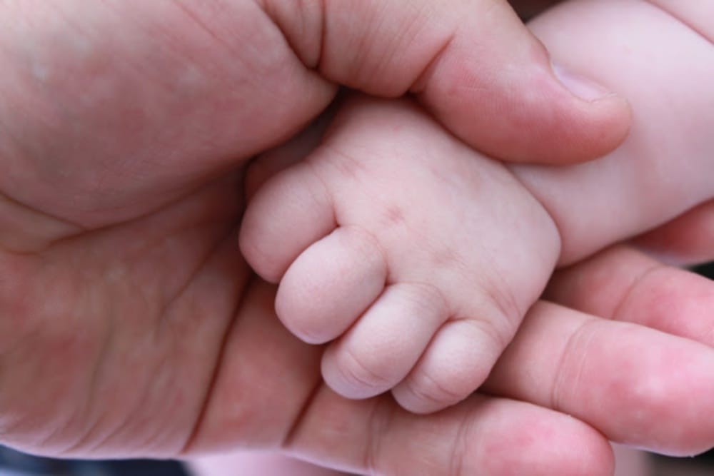 New born baby thrown at hospital back side 