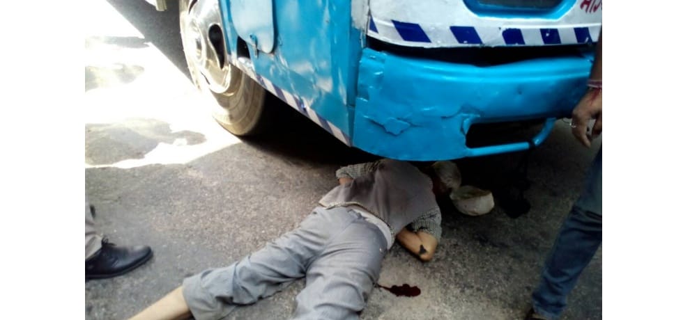 Man crushed under bus while crossing the road 