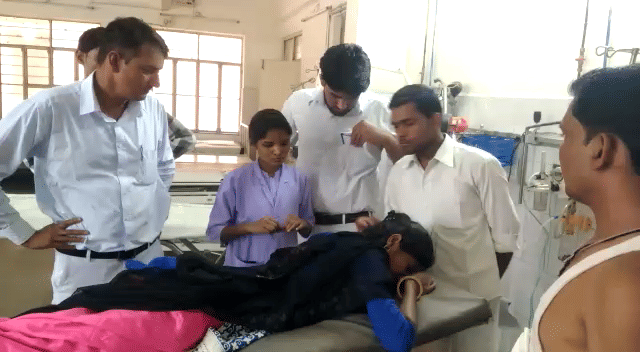 Husband wounded wife from glass bottle