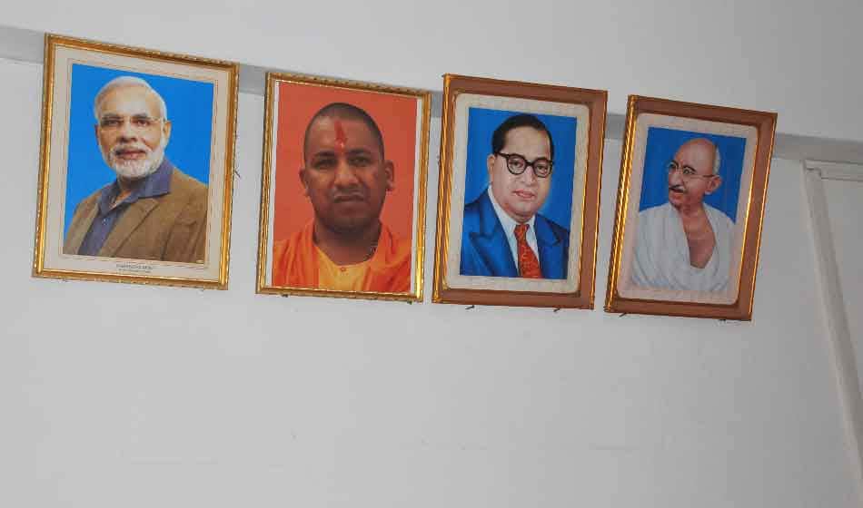 uttar pradesh government officers using bjp leaders photos in office to impress yogi adityanath