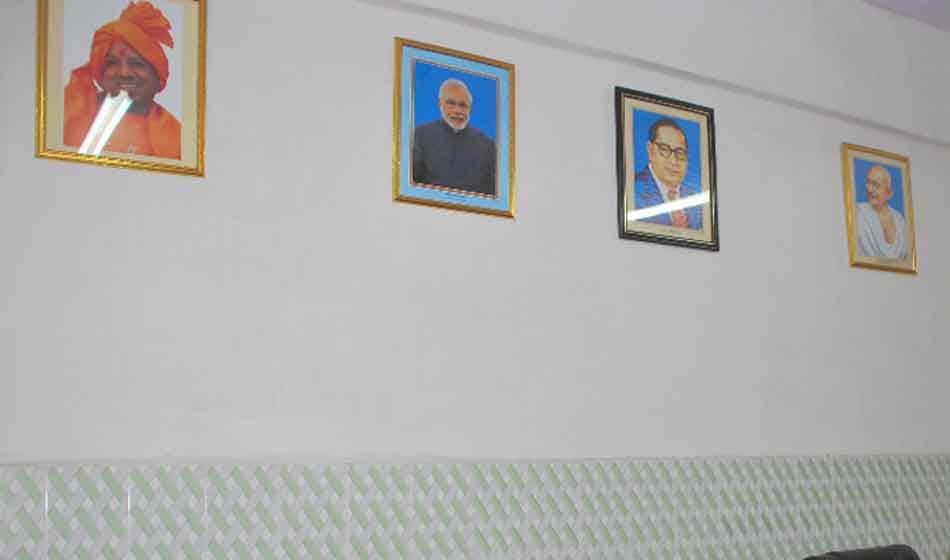 uttar pradesh government officers using bjp leaders photos in office to impress yogi adityanath