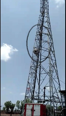 youth on mobile tower