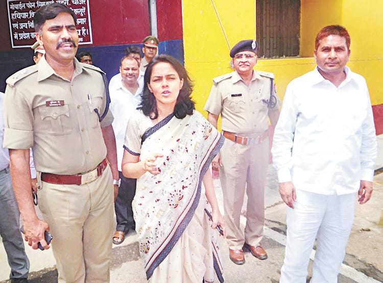 Officers inspect the jail