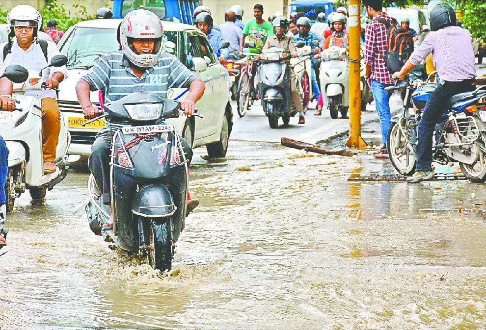 Photos of Water logging after rain in dehradun 
