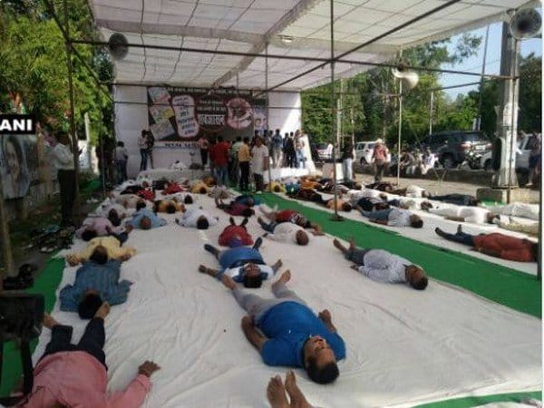 Congress workers celebrate mourning day at Bhopal on Yoga Day in Bhopal