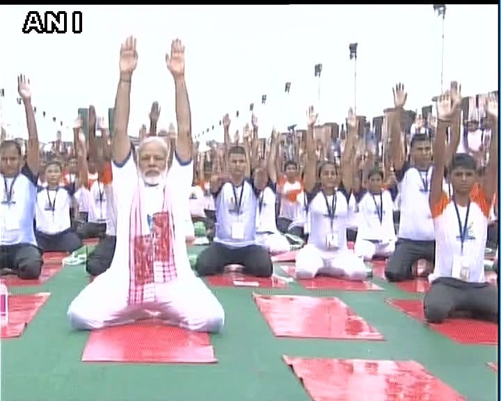 Prime Minister Narendra Modi while doing yoga despite rains in Lucknow,see photos