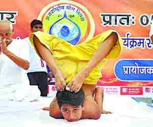 Yoga day celebrations despite heavy rain.