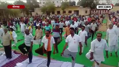 PEOPLE PERFORM YOGA IN SONBHADRA ON INTERNATIONAL YOGA DAY 