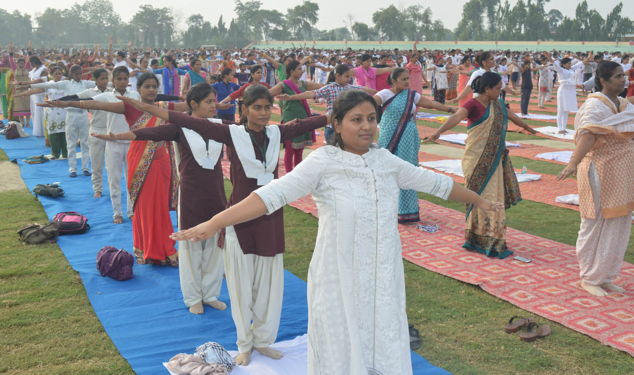 People on the side of yoga