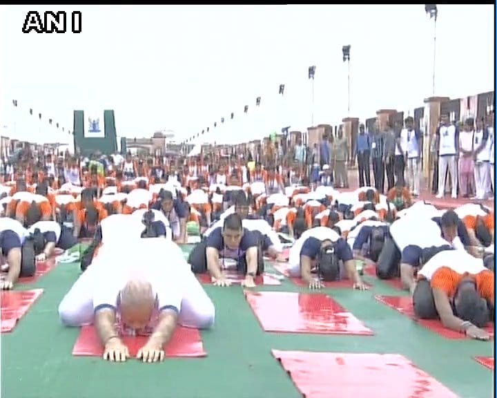 Prime Minister Narendra Modi while doing yoga despite rains in Lucknow,see photos
