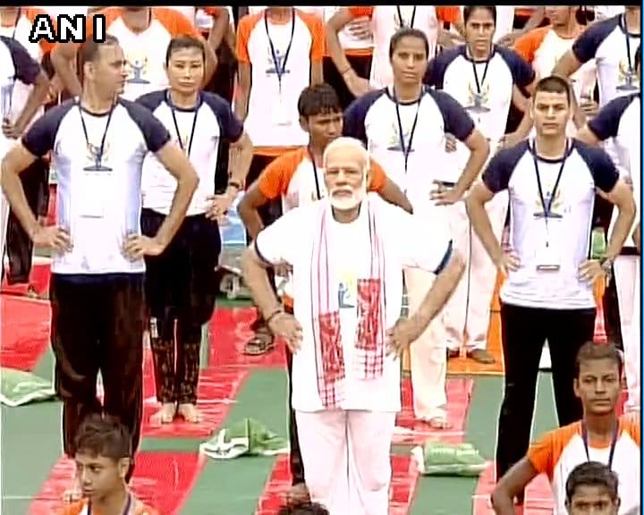 Prime Minister Narendra Modi while doing yoga despite rains in Lucknow,see photos