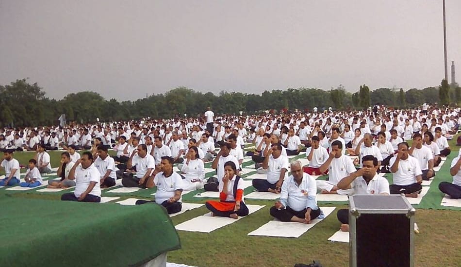 on international yoga day kejriwal and other do yoga and samajwadi party leaders ride bicycle