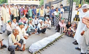 Crushing a farmer's body in front of the collectorate