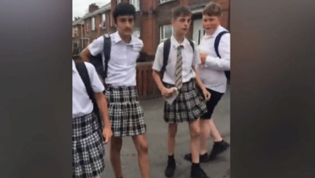 Teenage boys wear skirts to school to protest against 'no shorts' policy