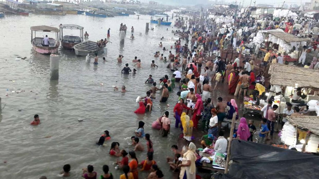 More than three lakh devotees plunge into the Ganga.