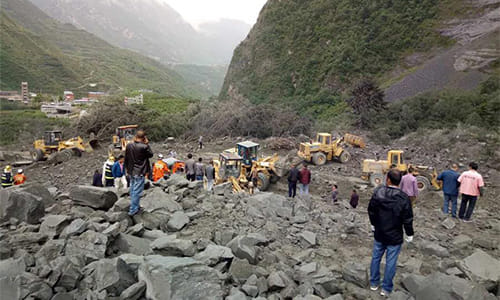 Around 100 people feared buried in China landslide