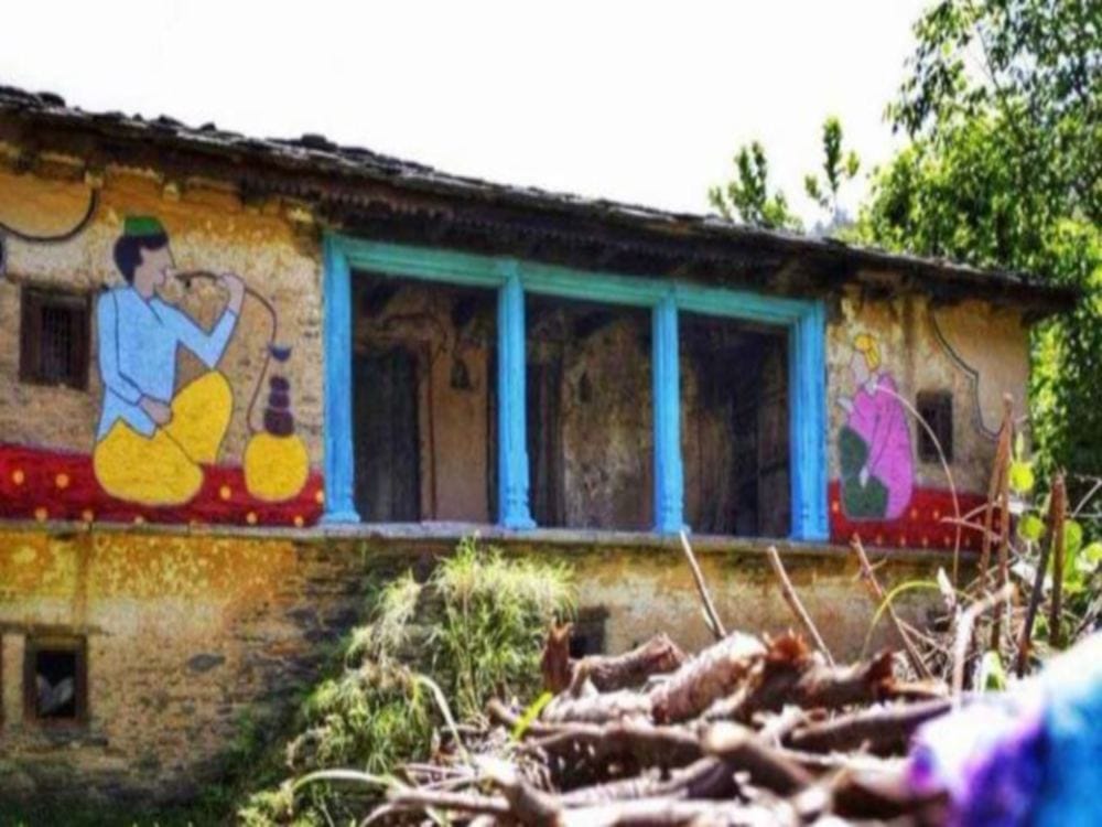 boy paint village with colours for stop Escape in uttarakhand 