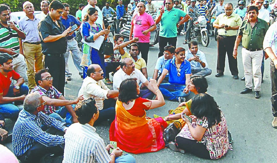 police inspector beat doctor, protest