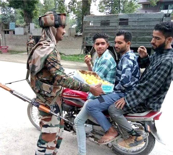 Army troops distributed sweets among people in kashmir