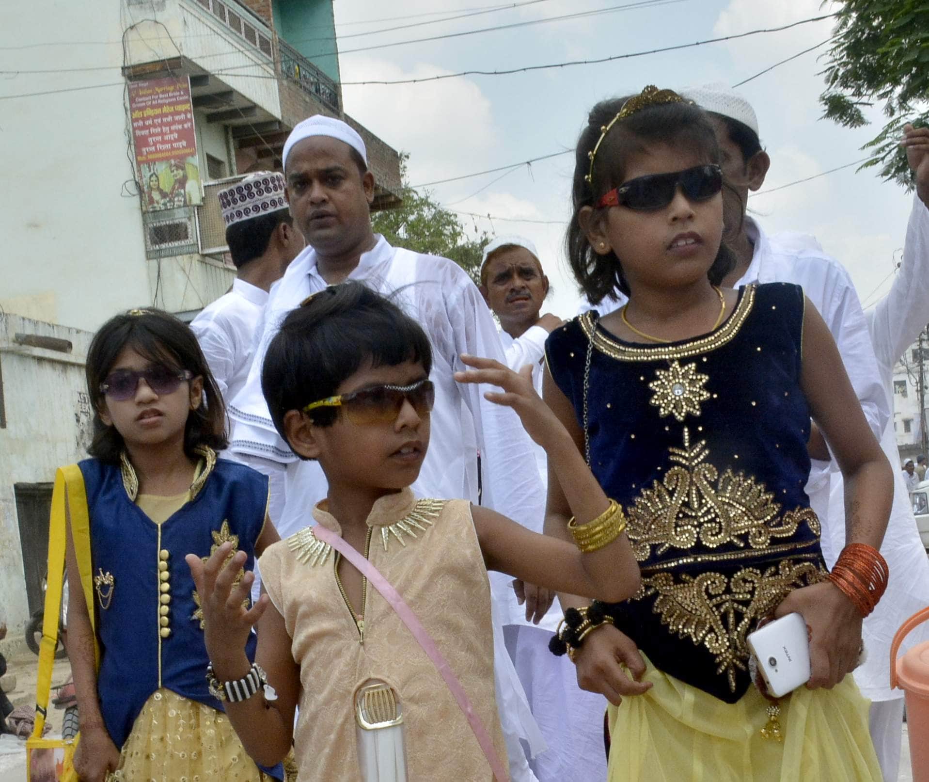 Eid Mubarak head bowed down in sweat, sewage sweetened in happiness