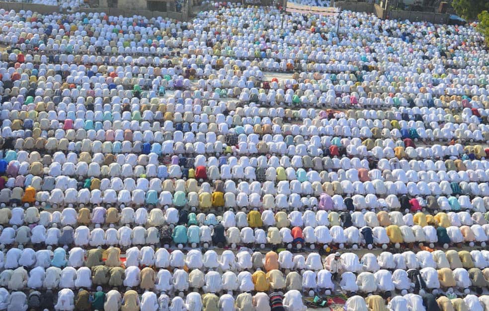 Eid Mubarak head bowed down in sweat, sewage sweetened in happiness