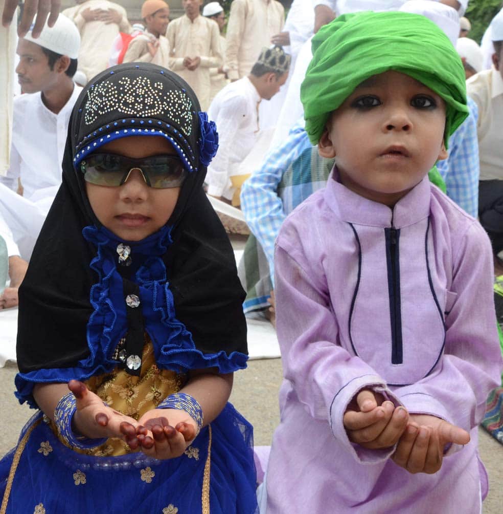 Eid Mubarak head bowed down in sweat, sewage sweetened in happiness