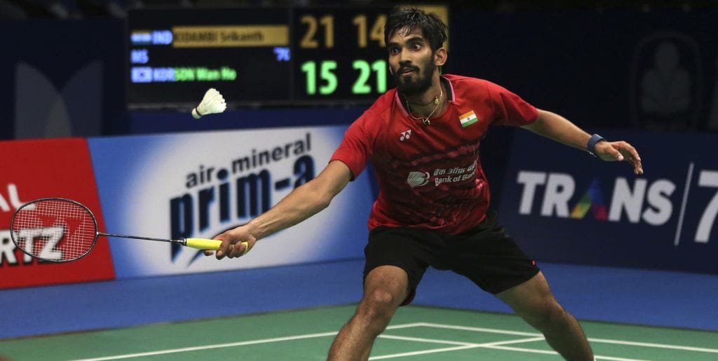 kidambi srikanth receives a bat from ms dhoni