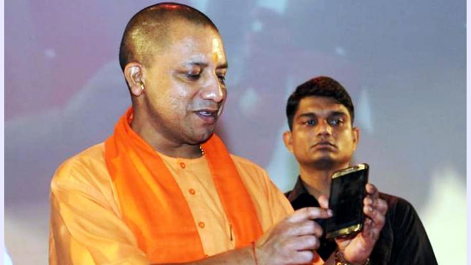 yogi adityanath presents report card of 100 days