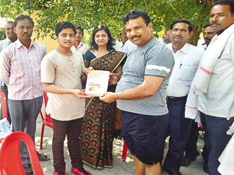 Parth presented the book to the legislator