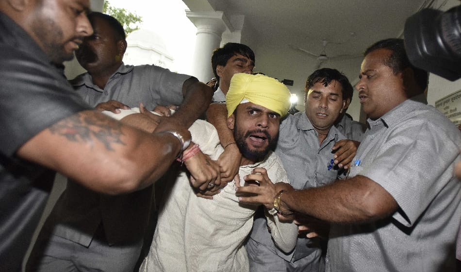 two visitors threw paper missiles in the Delhi Assembly,gets one-month prison term 