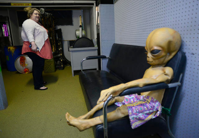 ALIEN LIKE DOLL FOUND IN SPEEDING CAR AT Alpharetta IN Georgia